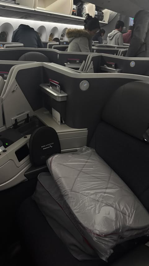 Instagram post by @meggymeza for American Airlines. Caption reads: @americanair flew us flagship first for our....