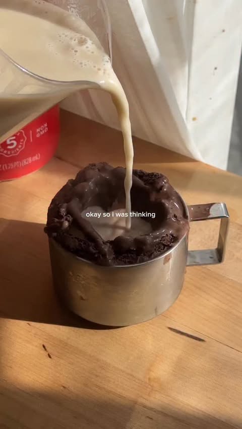 Instagram post by @olivianoceda for MALK Organics. Caption reads: reverse affogato with @malkorganics Holiday Nog is....