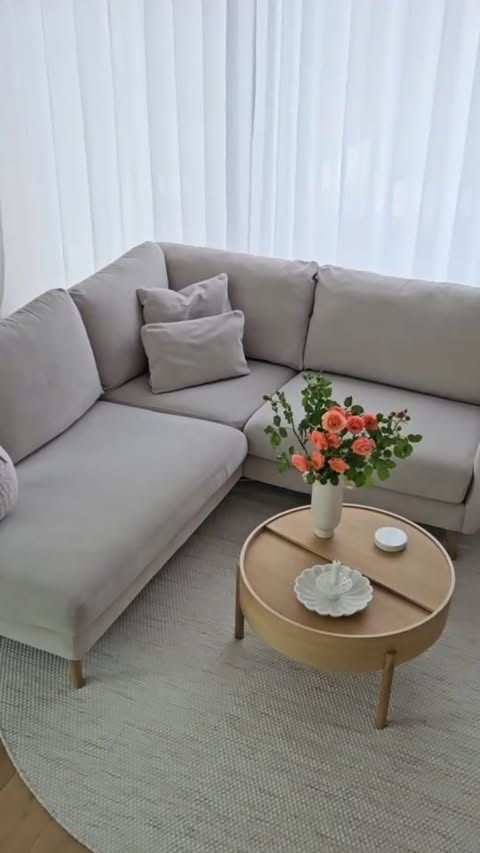 Instagram post by @avery_waylen for Pottery Barn. Caption reads: [...] The round wooden coffee table from Pottery....