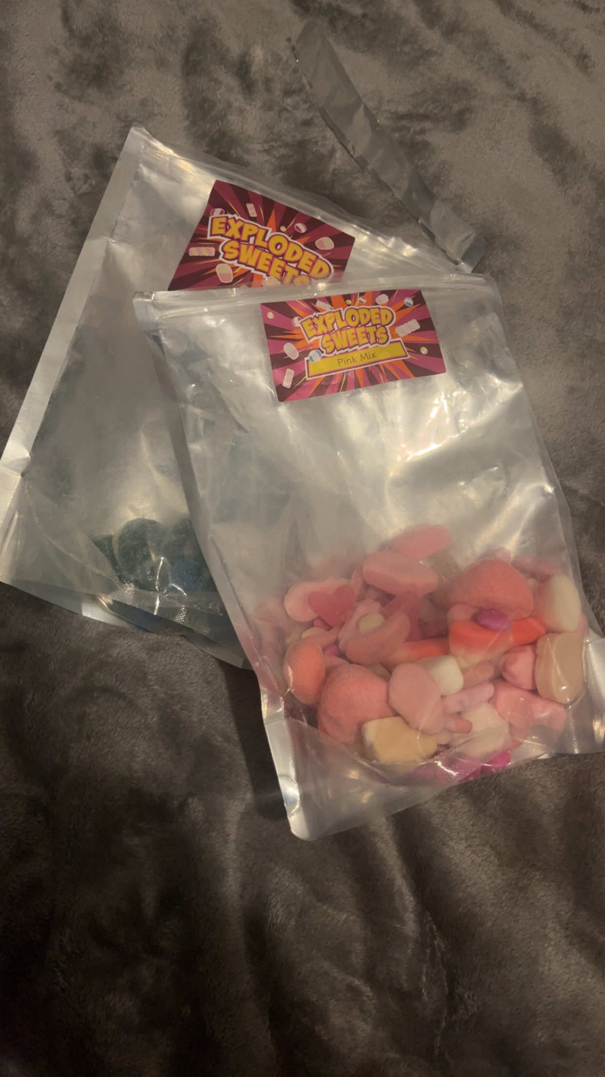 TikTok post by @ashden.b for Exploded Sweets. Caption reads: @Exploded Sweets 🤤 #fyp #sweets #candy....