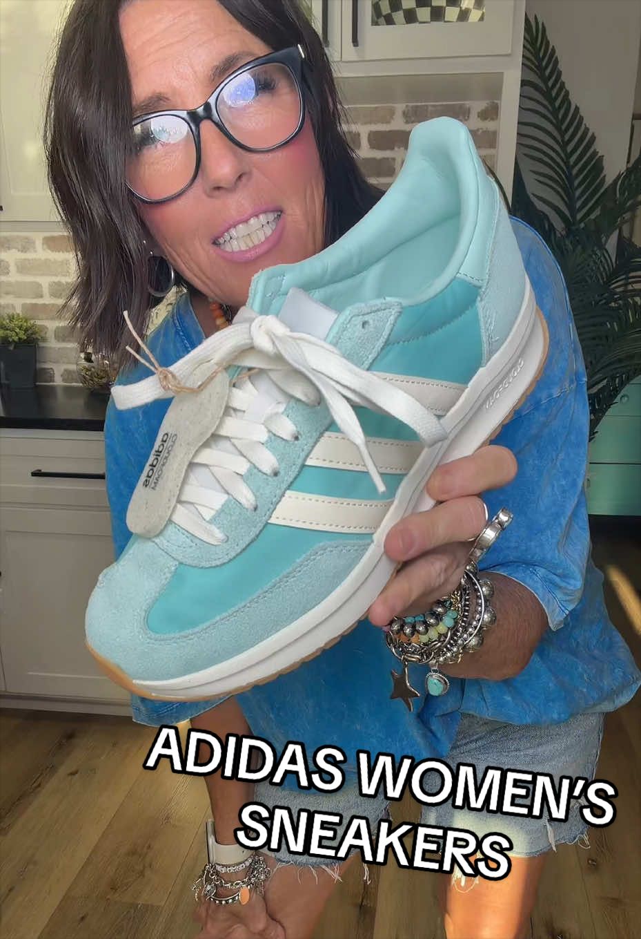 TikTok post by @twoboymom3 for SHOEBACCA.COM. Caption reads: Love this turquoise blue color…ADIDAS WOMEN’S....