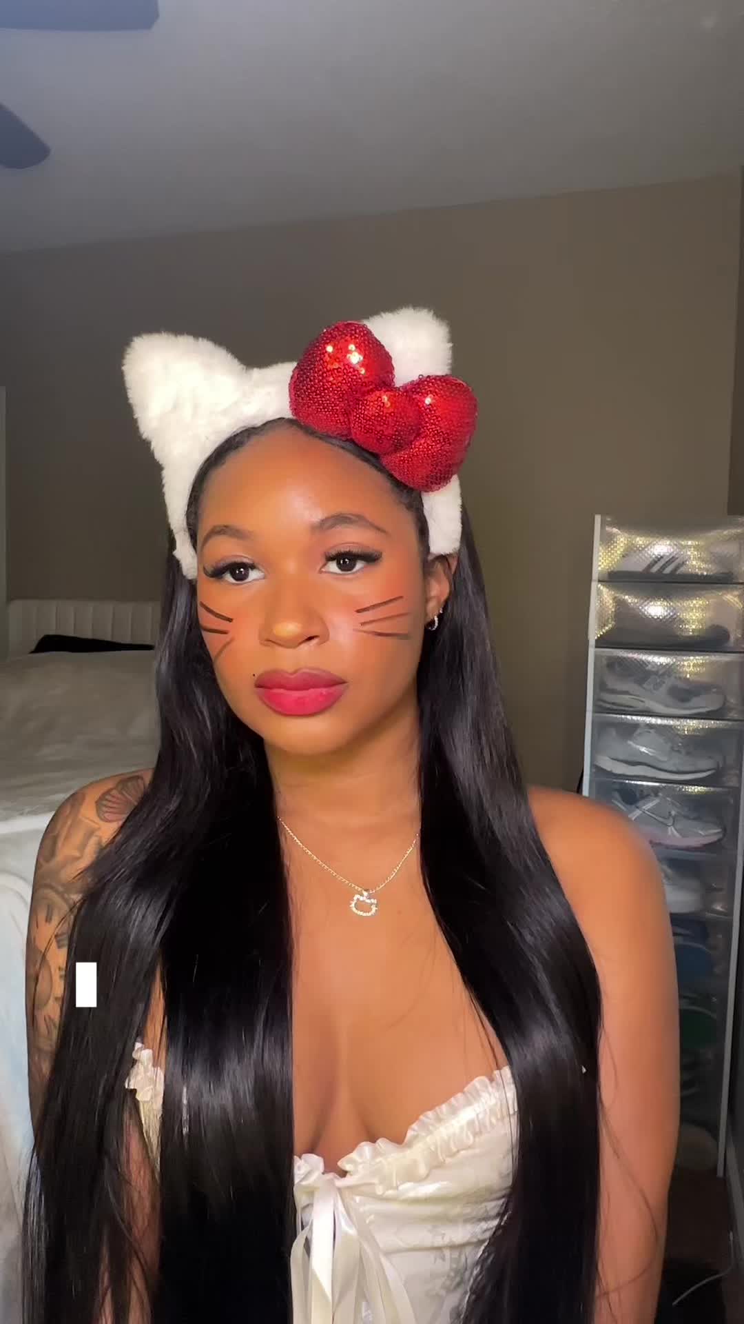 TikTok post by @its.aaliyahxx for Laura Mercier. Caption reads: The girls loved my Hello Kitty costume so here’s....