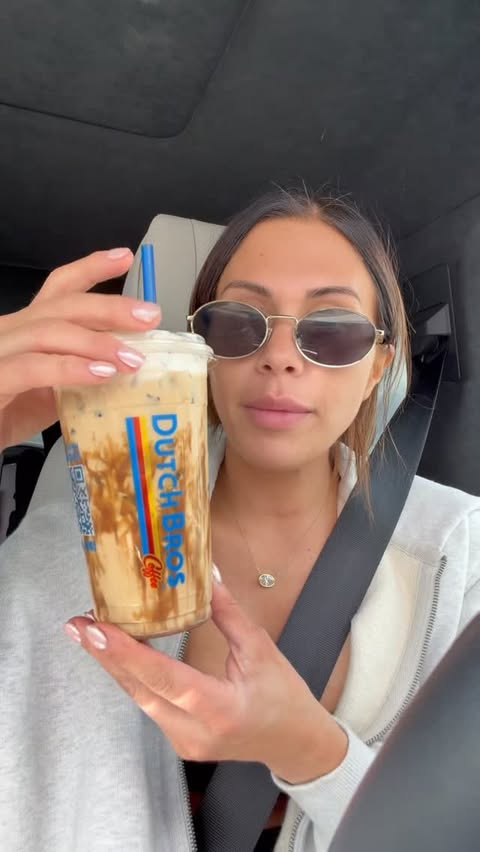 Instagram post by @_justjessiiii for Dutch Bros Coffee. Caption reads: Starting the day off right with @dutchbroscoffee....