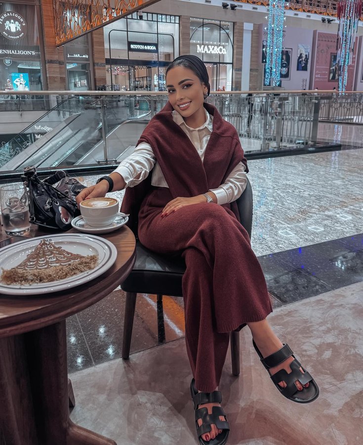 Instagram post by @ayahsharafdesigns for The Giving Movement. Caption reads: In love with the new collection from....