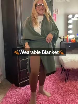 TikTok post by @15naynay for Songling Fashion. Caption reads: This #wearableblanket is gonna come in clutch for....