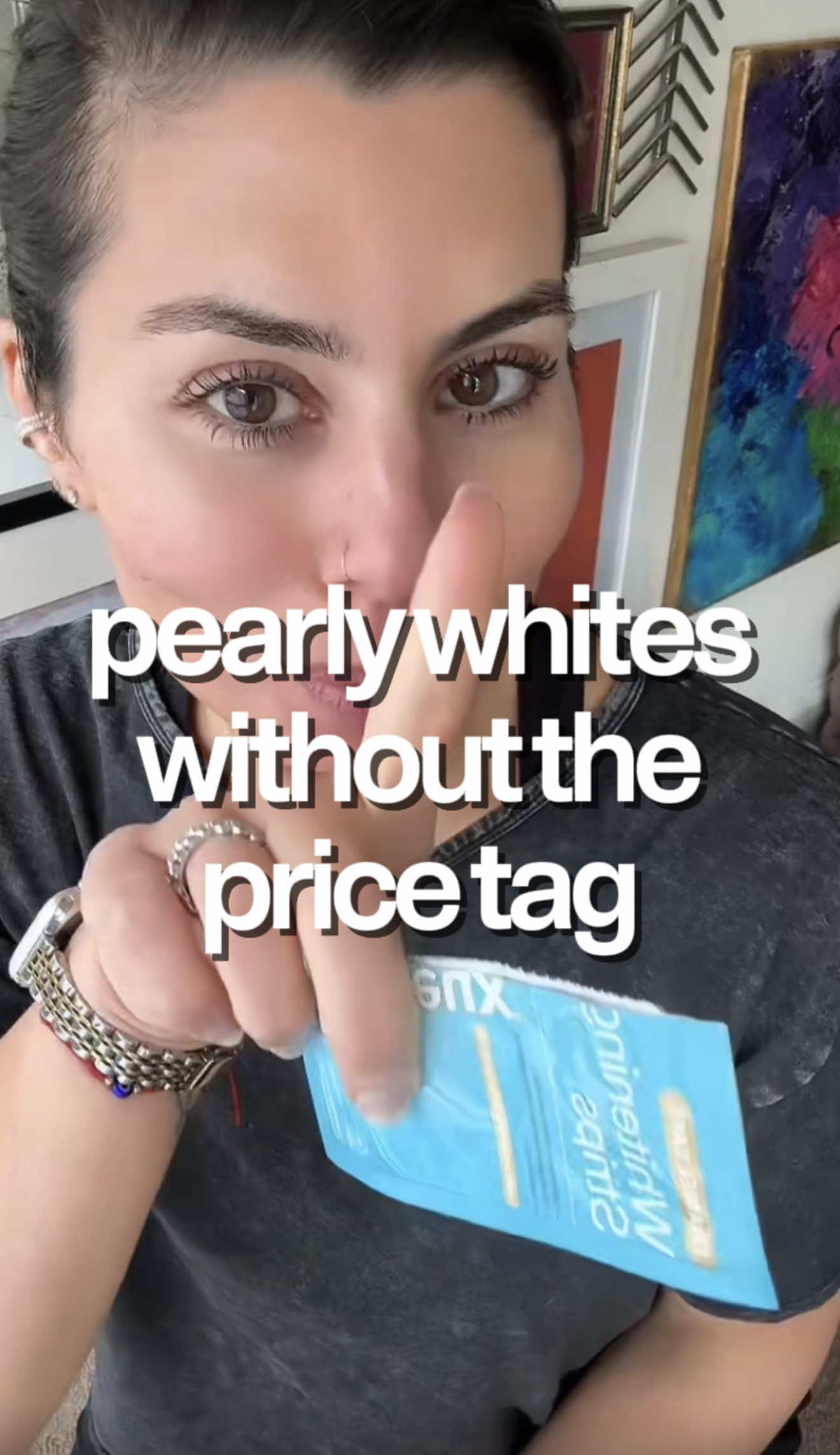 TikTok post by @brittanyfenza for Lumineux. Caption reads: [...] thanking me for coming back to Lumineux 😭🦷....