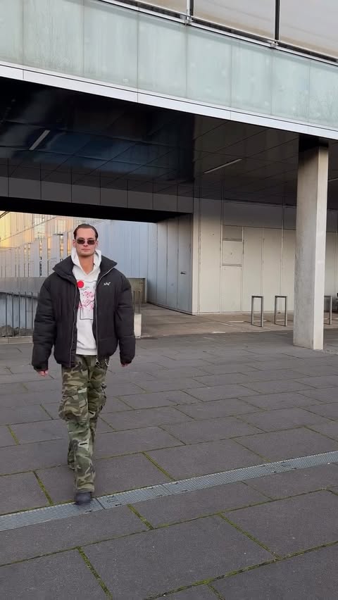 Instagram post by @jonny.melkus for Hoooyi. Caption reads: [...] come with me 🫵🏼

camo pants from....