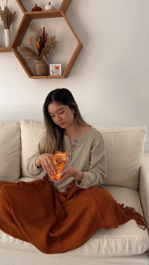 Instagram post by @winniekison for Partake Foods. Caption reads: decorating my home with all the fall + pumpkin....