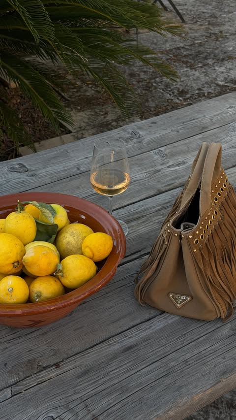 Instagram post by @bethanmccoy for PrettyLittleThing. Caption reads: euro summer is almost here 🍋💛💫🌼....