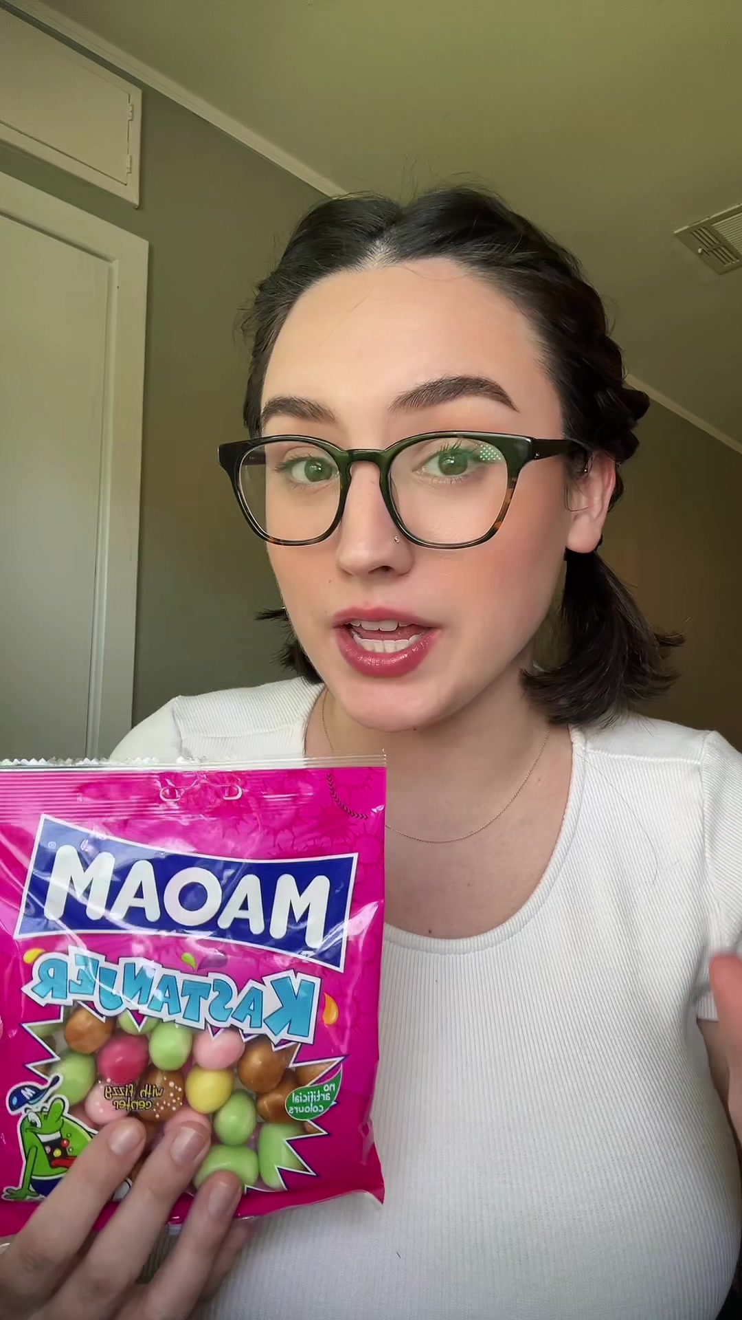 TikTok post by @byamber.co for Scandycandy. Caption reads: I’m a candy addict - HELP. @ScandyCandy....