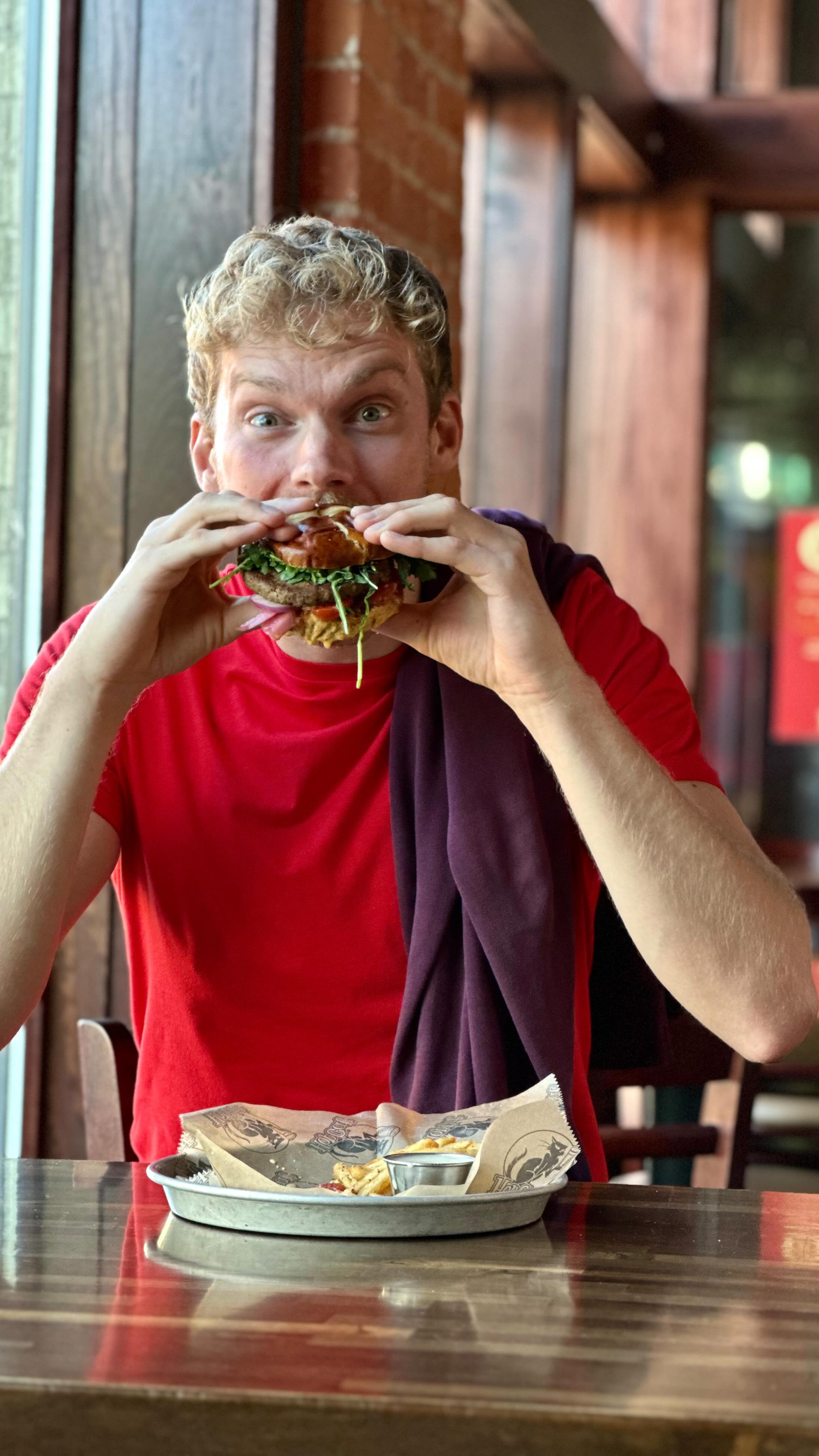 Instagram post by @ryanredoute for Impossible Foods. Caption reads: 👊 To every Michigander running the Detroit....