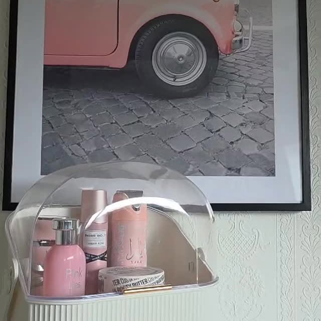 Instagram post by @maria_sidelkova for Poster Store. Caption reads: Bright up your wall with a little pink sparkle....