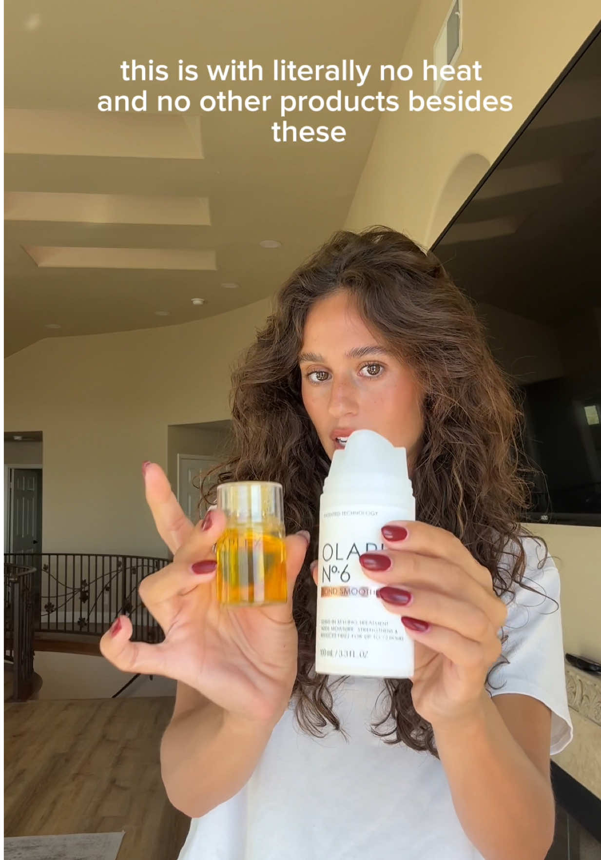 TikTok post by @ellasandramuse for OLAPLEX. Caption reads: go get the @Olaplex Iconic Shine Set at Sephora....