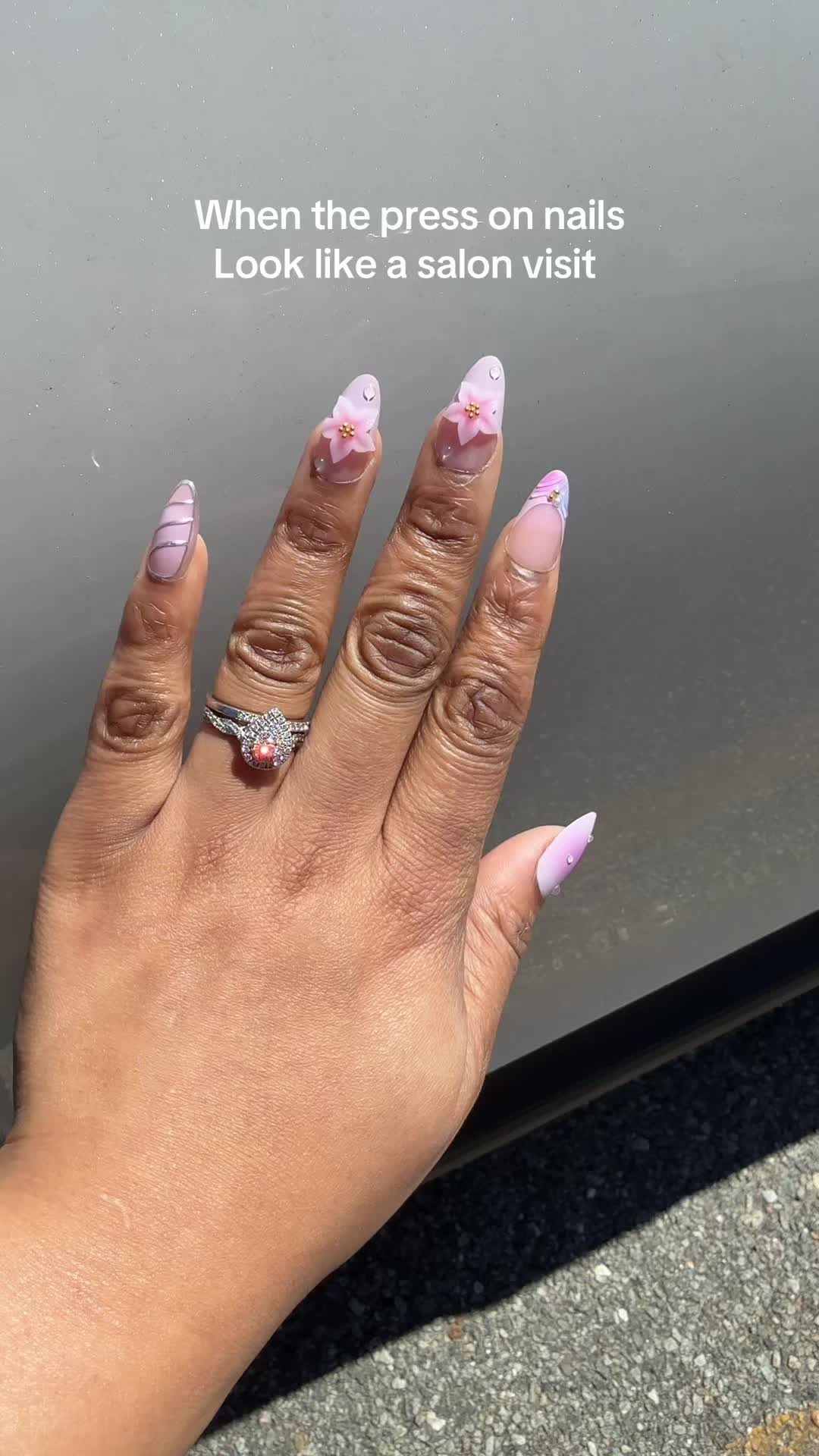 TikTok post by @astrema.simone for Nailboo. Caption reads: @Nailboo press on nails are too cute [...].
