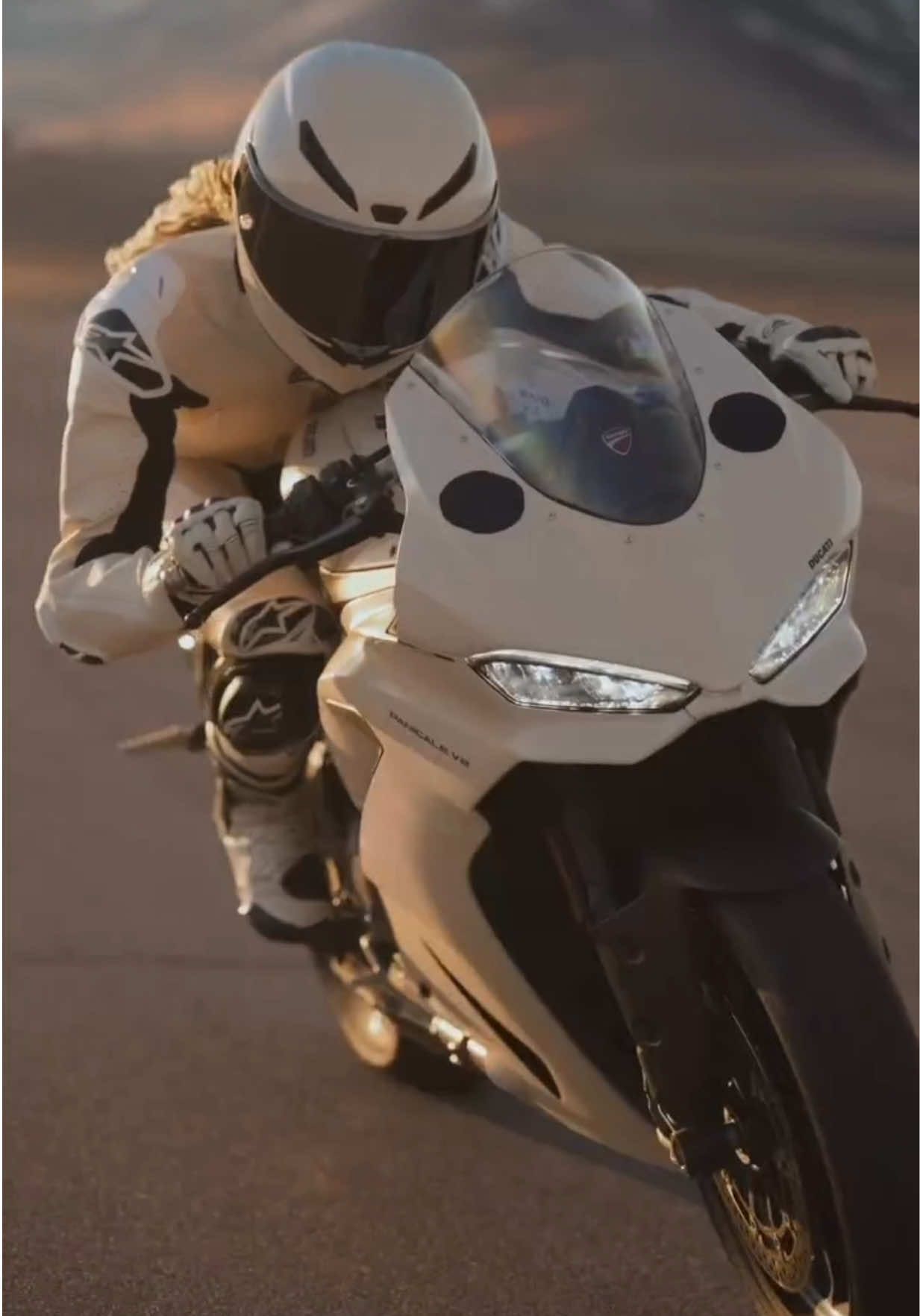 TikTok post by @jordan.rand for Ducati. Caption reads: [...] take my chances 💜🏍️ @chanel.beauty @ducati....