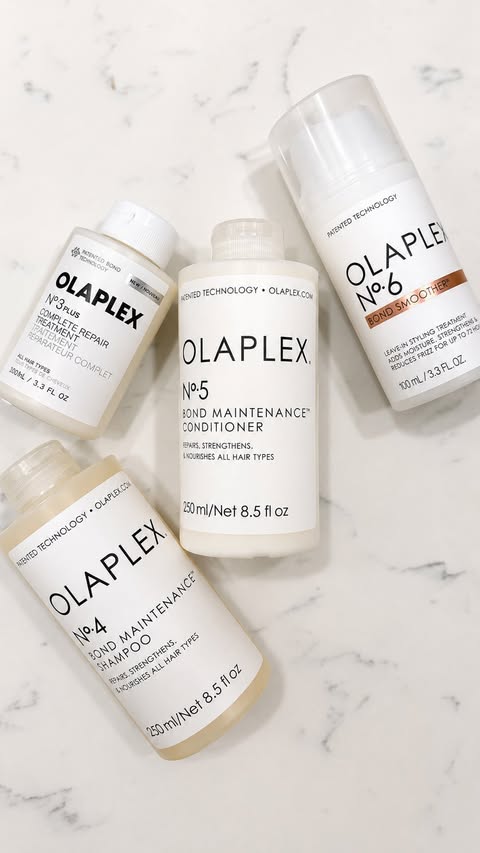 Instagram post by @theeerealchanel for OLAPLEX. Caption reads: [...] 25th. Restock your essentials today.....