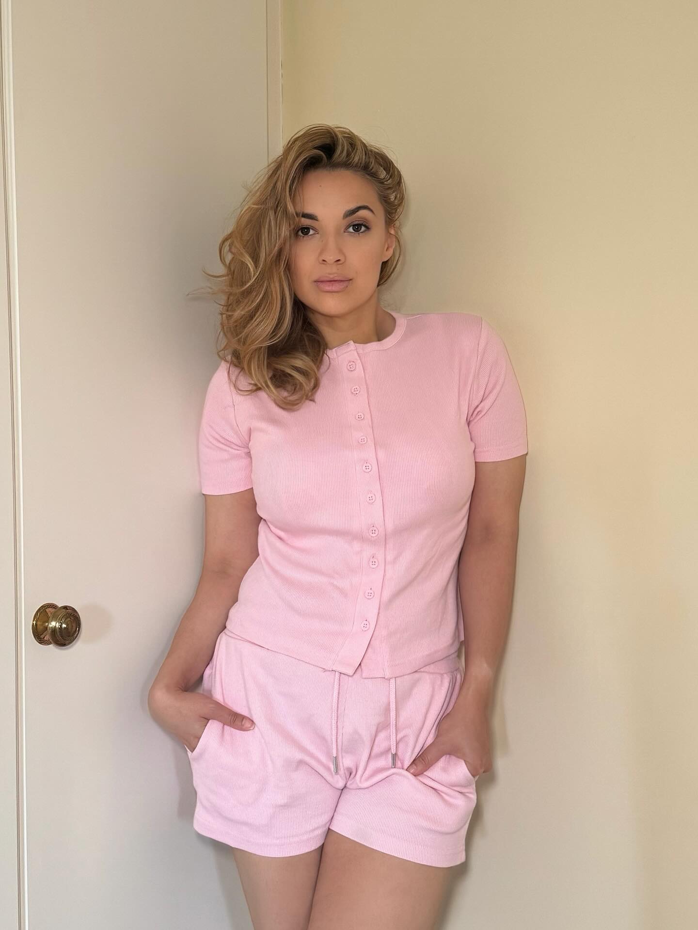 Instagram post by @misschanteller for Femme Luxe. Caption reads: 💕🌸👛 

Ad @femmeluxefinery @femmeluxeusa #pr.