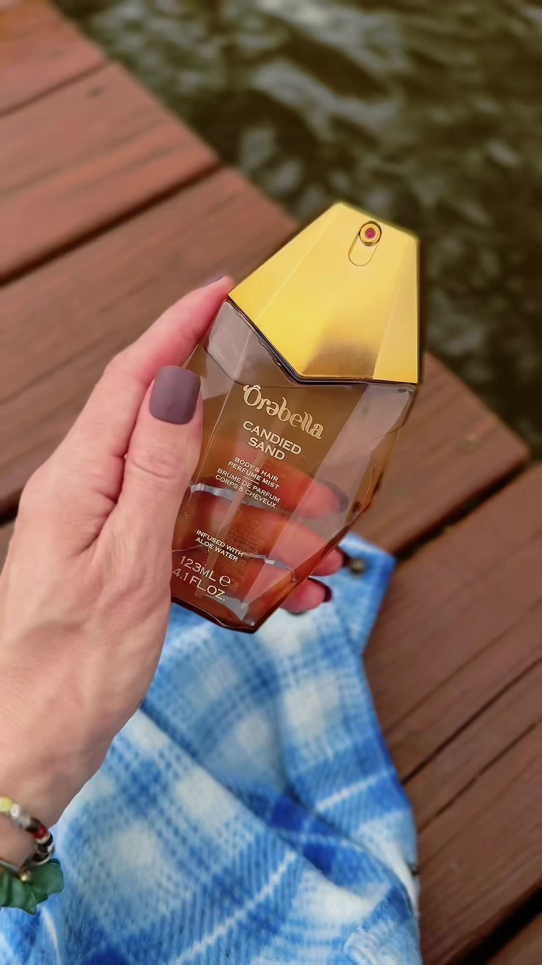TikTok post by @megs_beauty_content for Orebella. Caption reads: Gifted by Orebella @'Ôrəbella Candied Sand Body &....