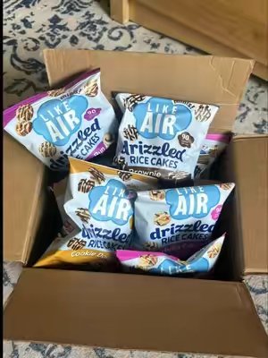 TikTok post by @luciarae33 for Like Air Puffcorn. Caption reads: [...] 🍪🧁Try them out for yourselves! @Like Air....
