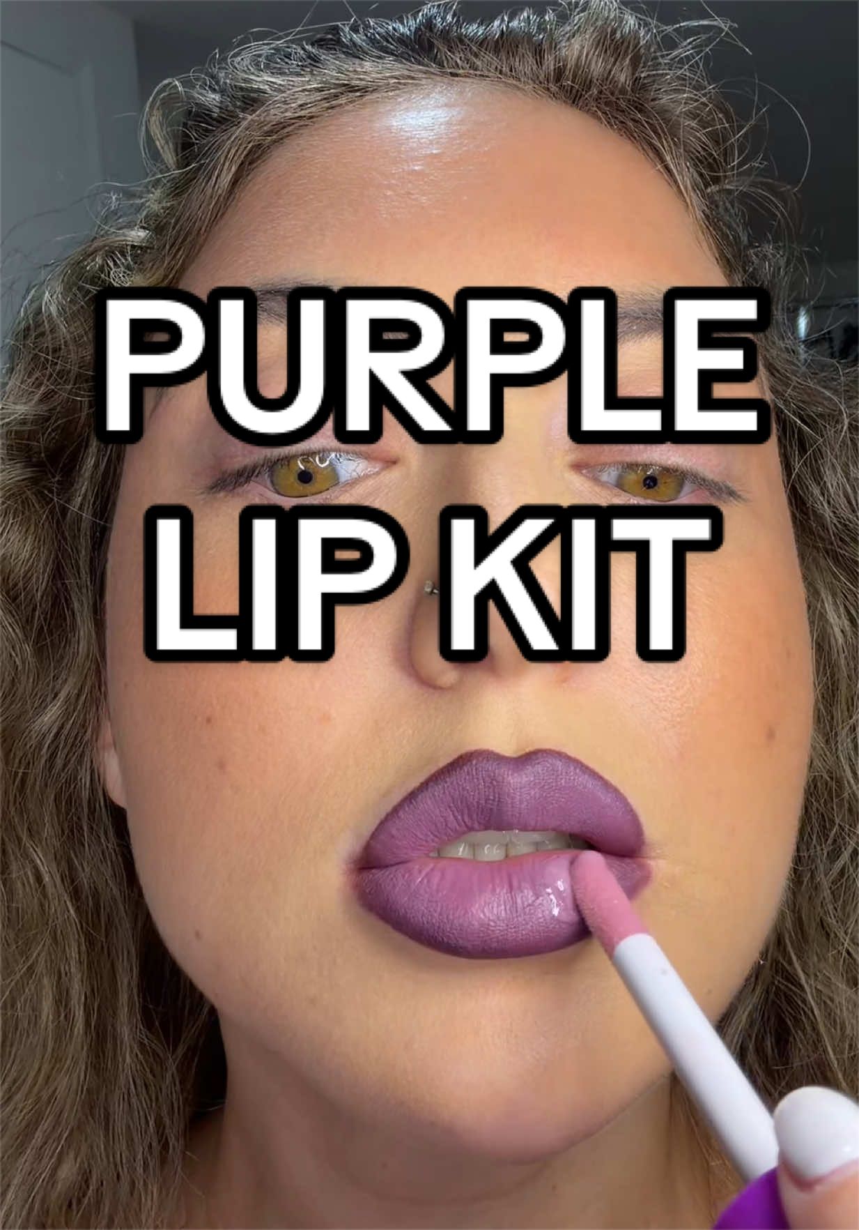 TikTok post by @kelseyalfred for Glamlite Cosmetics. Caption reads: 💜✨ try-on + first impressions of the Glamlite x....