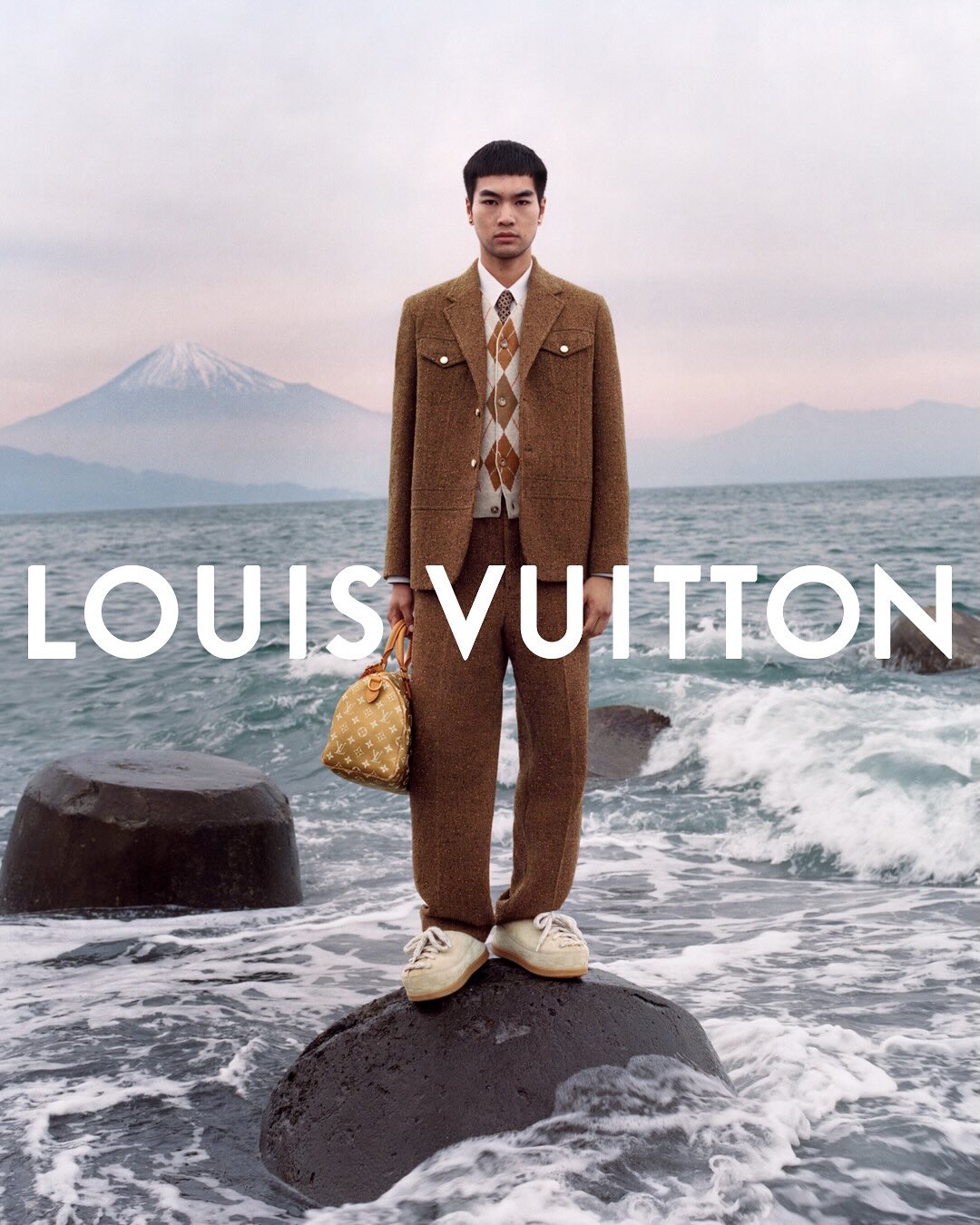 Instagram post by @pharrell for Louis Vuitton. Caption reads: Dandy disrupted. Dandy-inspired elegance....
