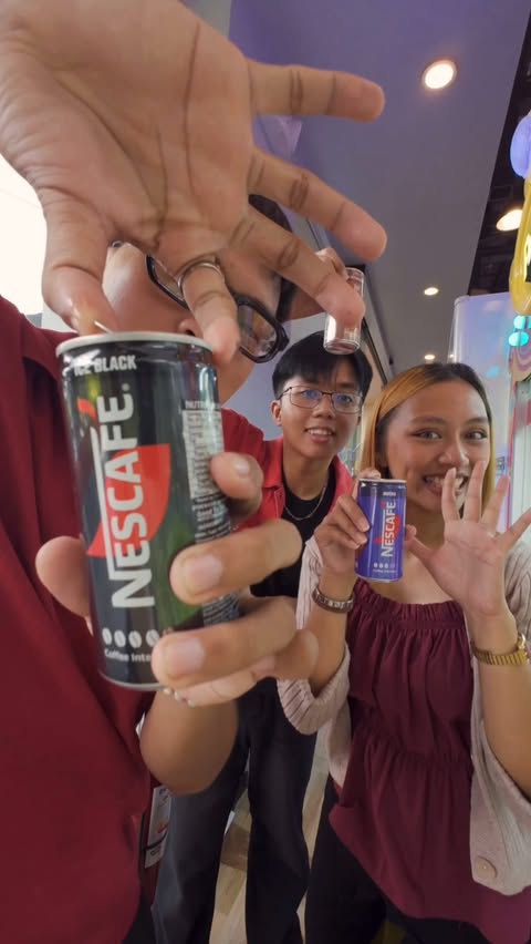 Instagram post by @yourlologab for NESCAFÉ Philippines. Caption reads: #GetBackGetUp with #NescafeReadyToDrink ☕️ Grab....