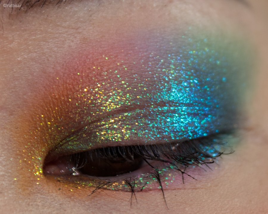 Instagram post by @ratboar for Adept Cosmetics. Caption reads: hello i am very much into these bright tones even....