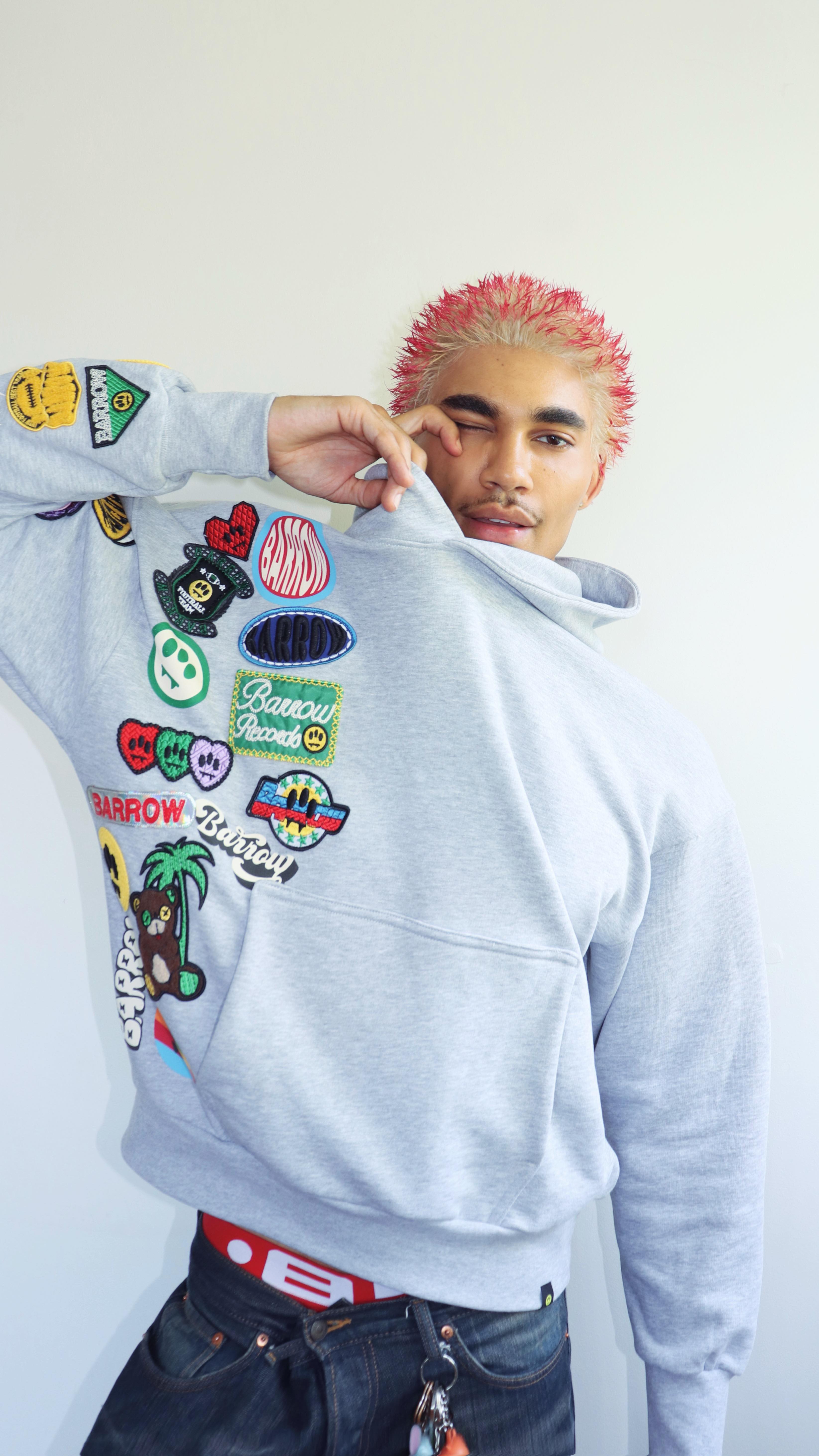 Instagram post by @dylanhasselbaink for Ebin New York. Caption reads: Spiky buzzcut with red tips 🙂‍↔️
Wig....