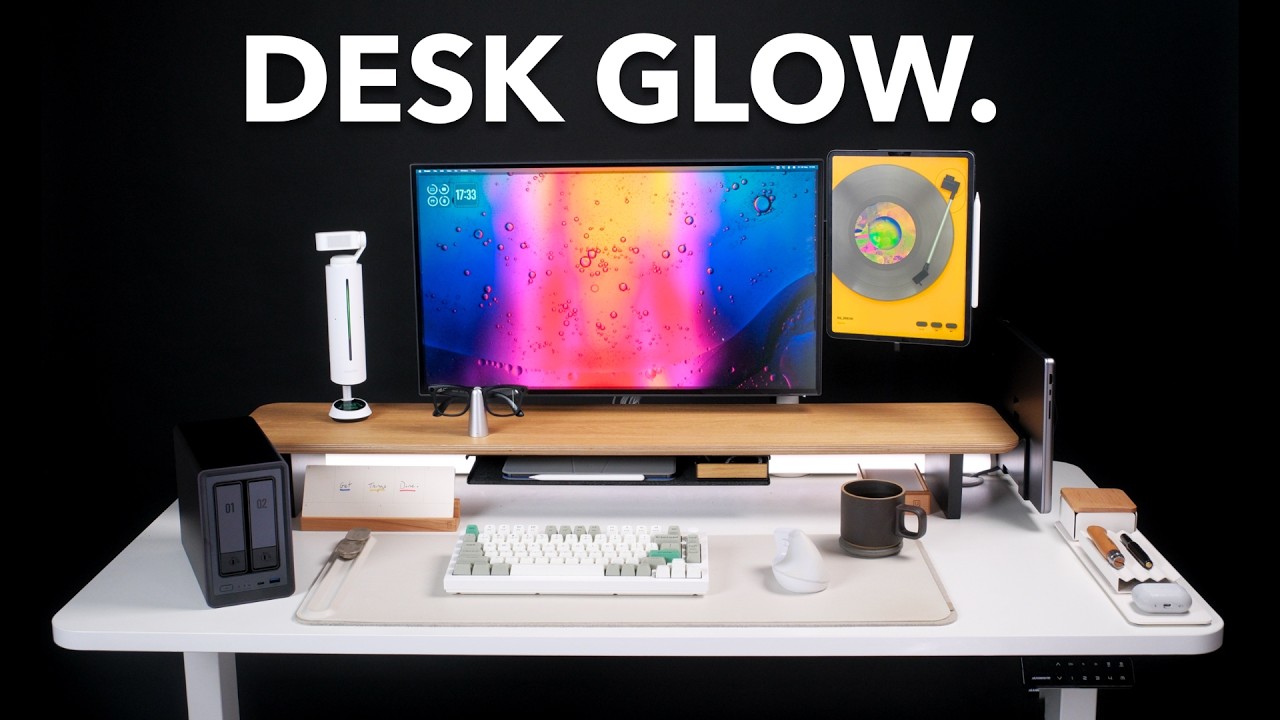 YouTube post by @BetterCreating for Orbitkey. Caption reads: I Tried 30+ Desk Setup Upgrades in 2025: These....