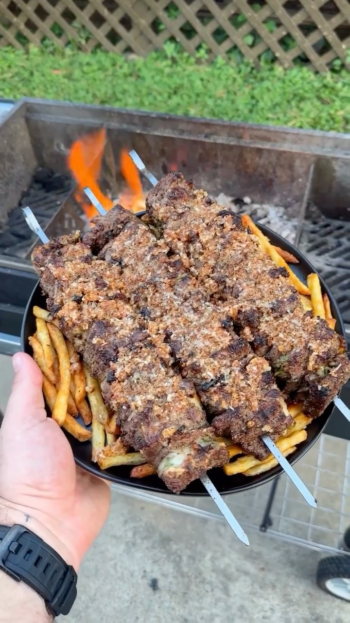 Instagram post by @overthefirecooking for Pendleton Whisky. Caption reads: French Onion Steak Skewers with @pendletonwhisky....