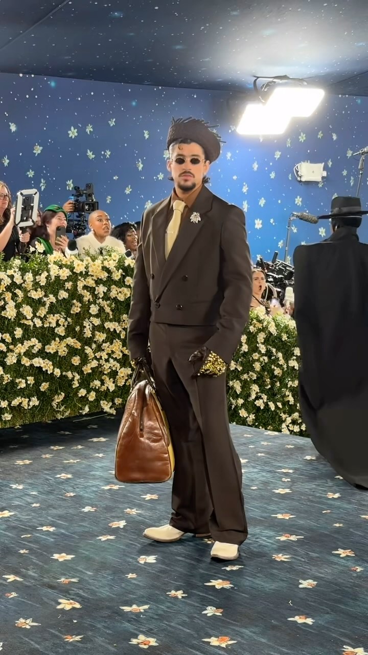 Instagram post by @hypebeastlatam for Hypebae. Caption reads: @badbunnypr dancing into the Met Gala in custom....