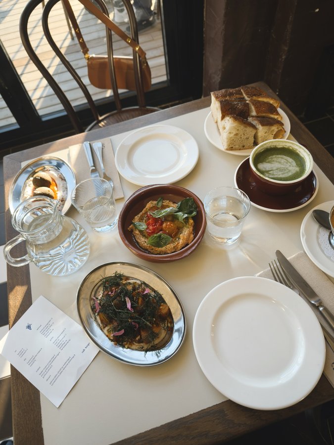 Instagram post by @katriinhu for CHANEL BEAUTY. Caption reads: yap, food, girlies, makeup, theatre, books,....