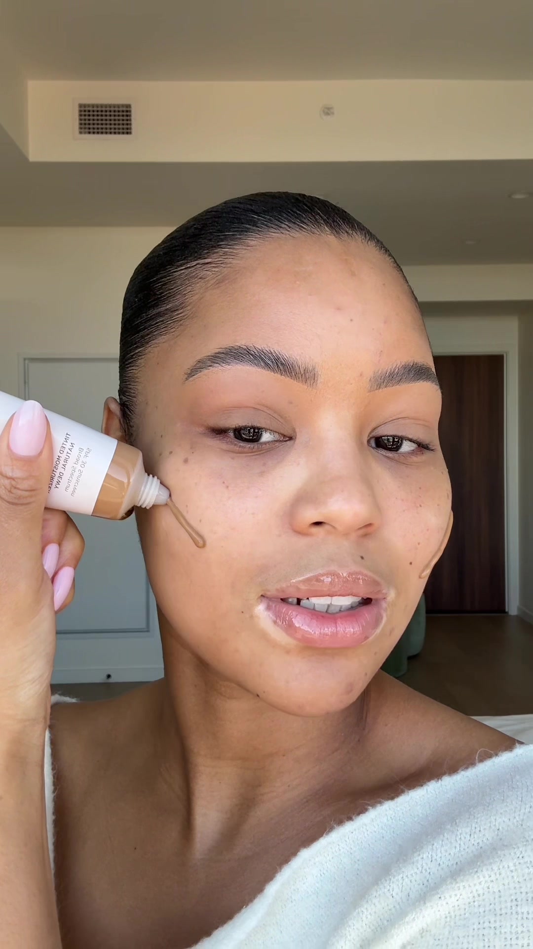 TikTok post by @teairawalker for Laura Mercier. Caption reads: In my no-makeup makeup era using @Laura Mercier....