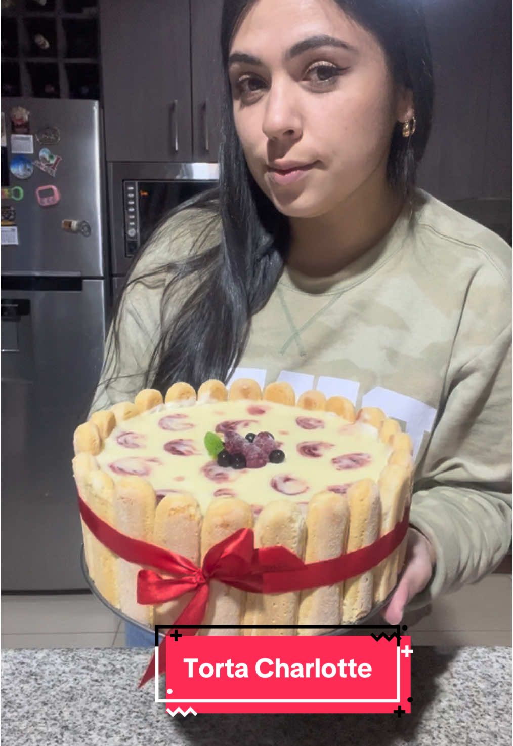 TikTok post by @gogogita for Santa Isabel. Caption reads: Torta Charlotte🍓🍰  Facil,rapida y rica♥️ #receta....