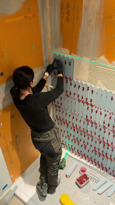 Instagram post by @tile.construction for Blåkläder. Caption reads: Rocking the @schlutersystemsna DESIGN-NICHE with a....