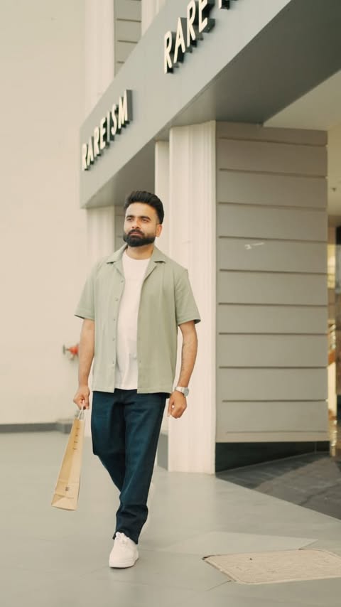 Instagram post by @ankitmishra_1310 for RARE RABBIT. Caption reads: [...] simply define your personality. 🖤 Rare....