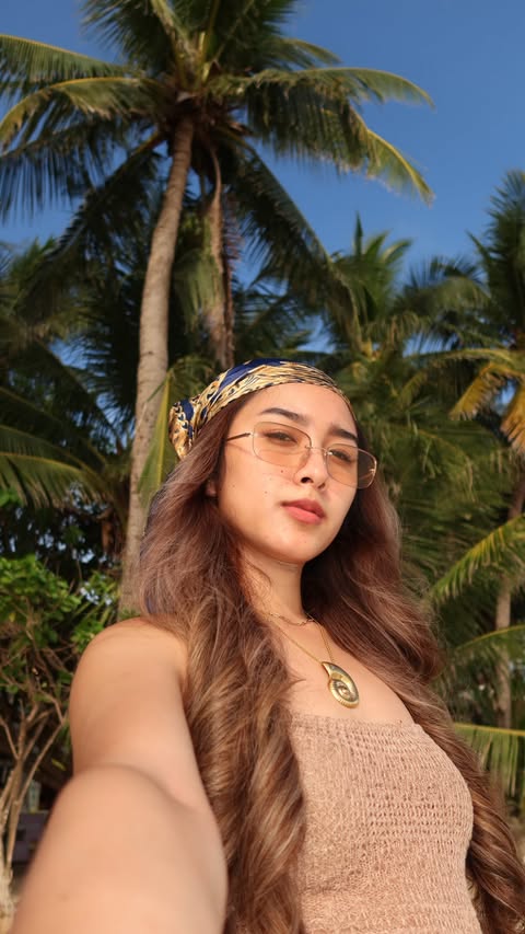 Instagram post by @gwendassel for Glad2Glow Philippines. Caption reads: Sun-kissed but protected ☀️✨ G2G Tone Up Sunscreen....