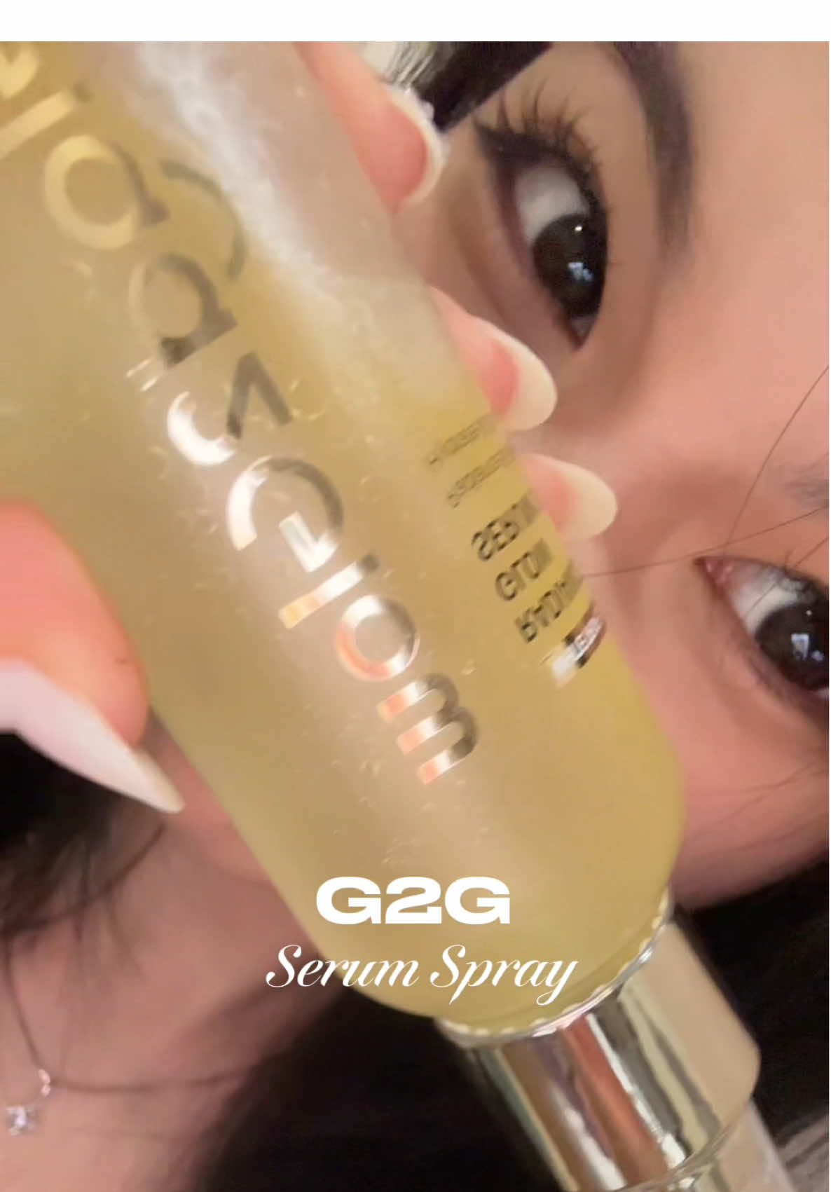 TikTok post by @nniiesha for Glad2Glow.my. Caption reads: LOVE. @Glad2Glow.my G2G Serum Spray....