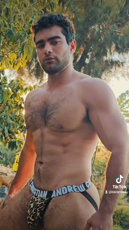 Instagram post by @oscar_vica for Andrew Christian. Caption reads: 🔥 savage lover

#AndrewChristian #trophyboy....