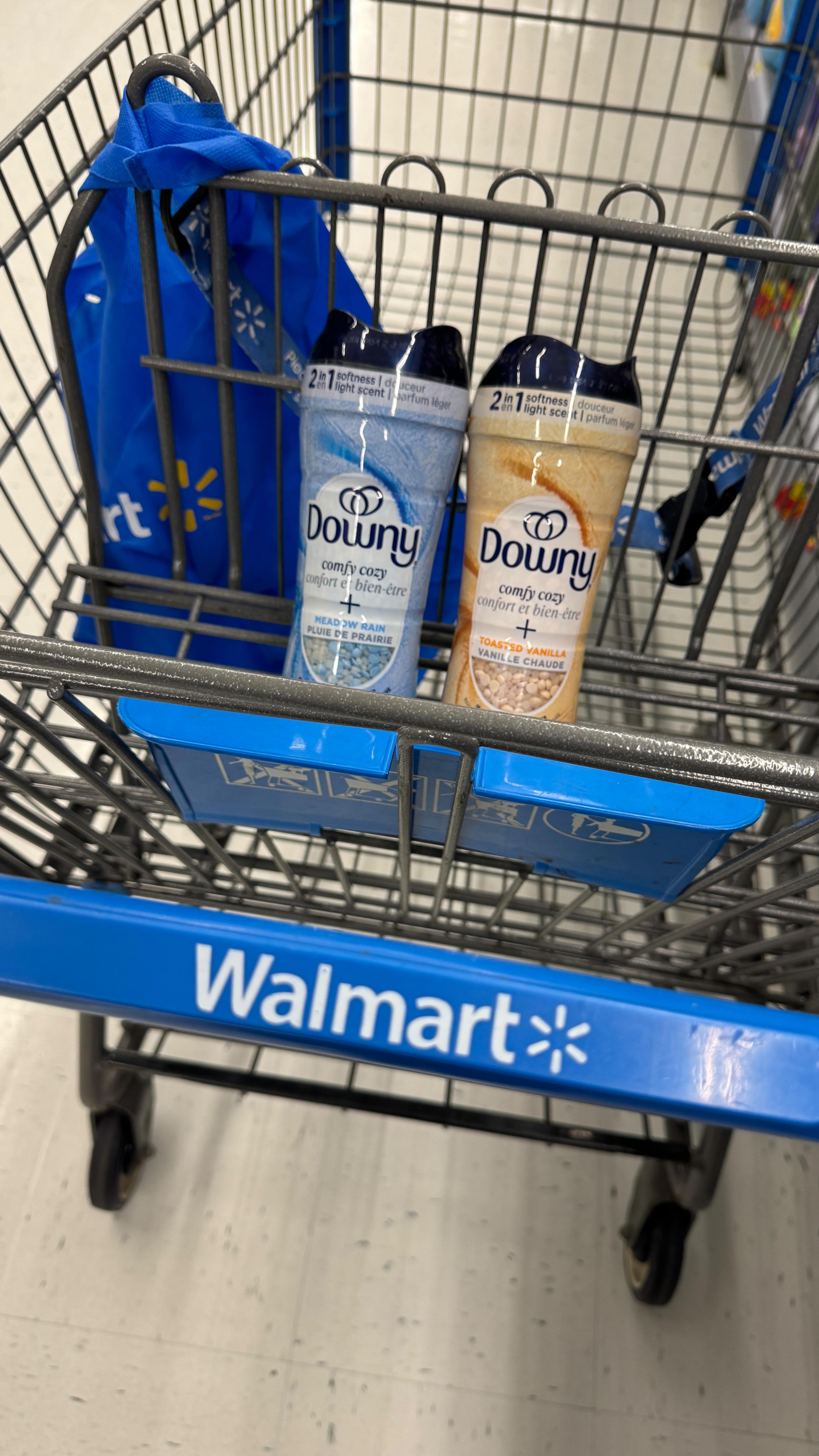 Instagram post by @livingonaloonie for downy. Caption reads: #ad | STACKING OFFERS! NEW hot offer on Downy....