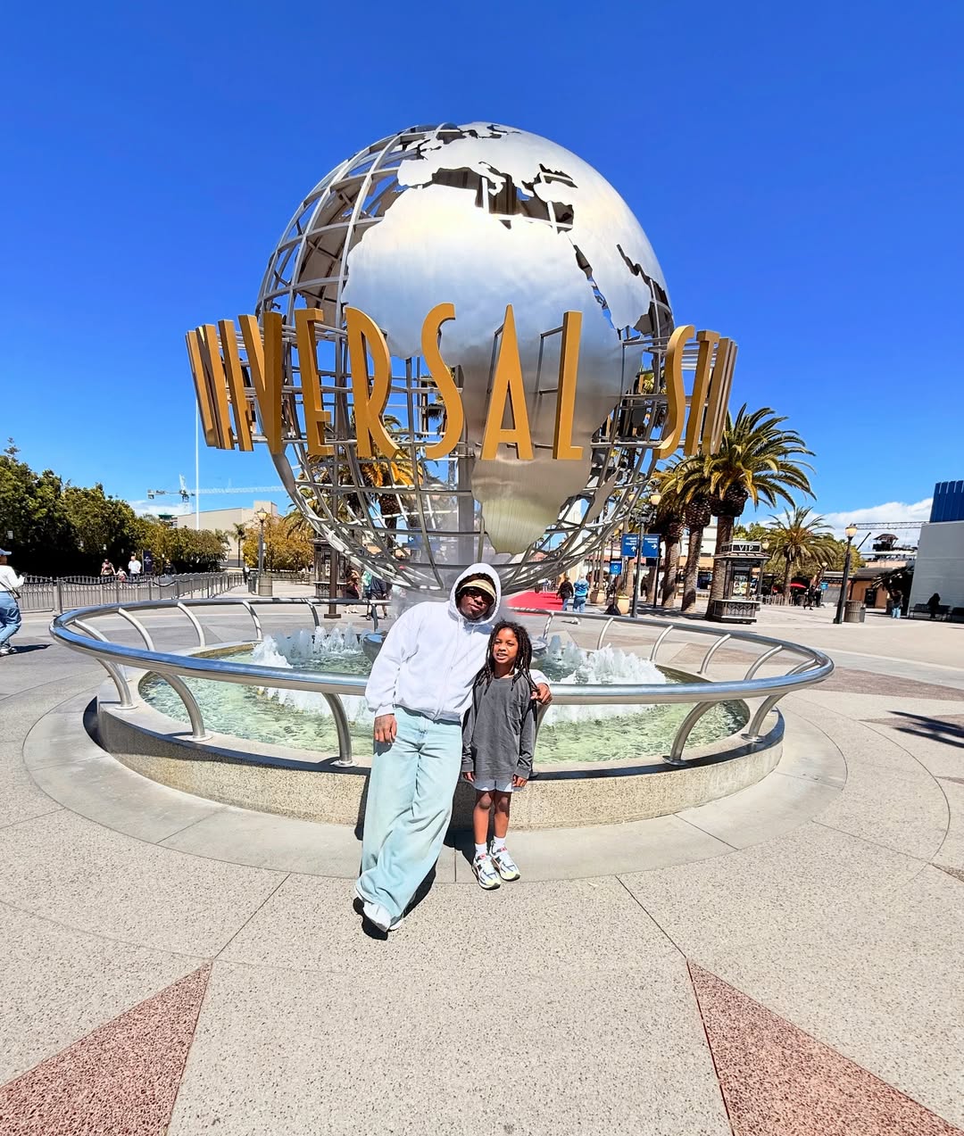 Instagram post by @blxst for Universal Studios Hollywood. Caption reads: full time dad 

spring beak vibes @unistudios....