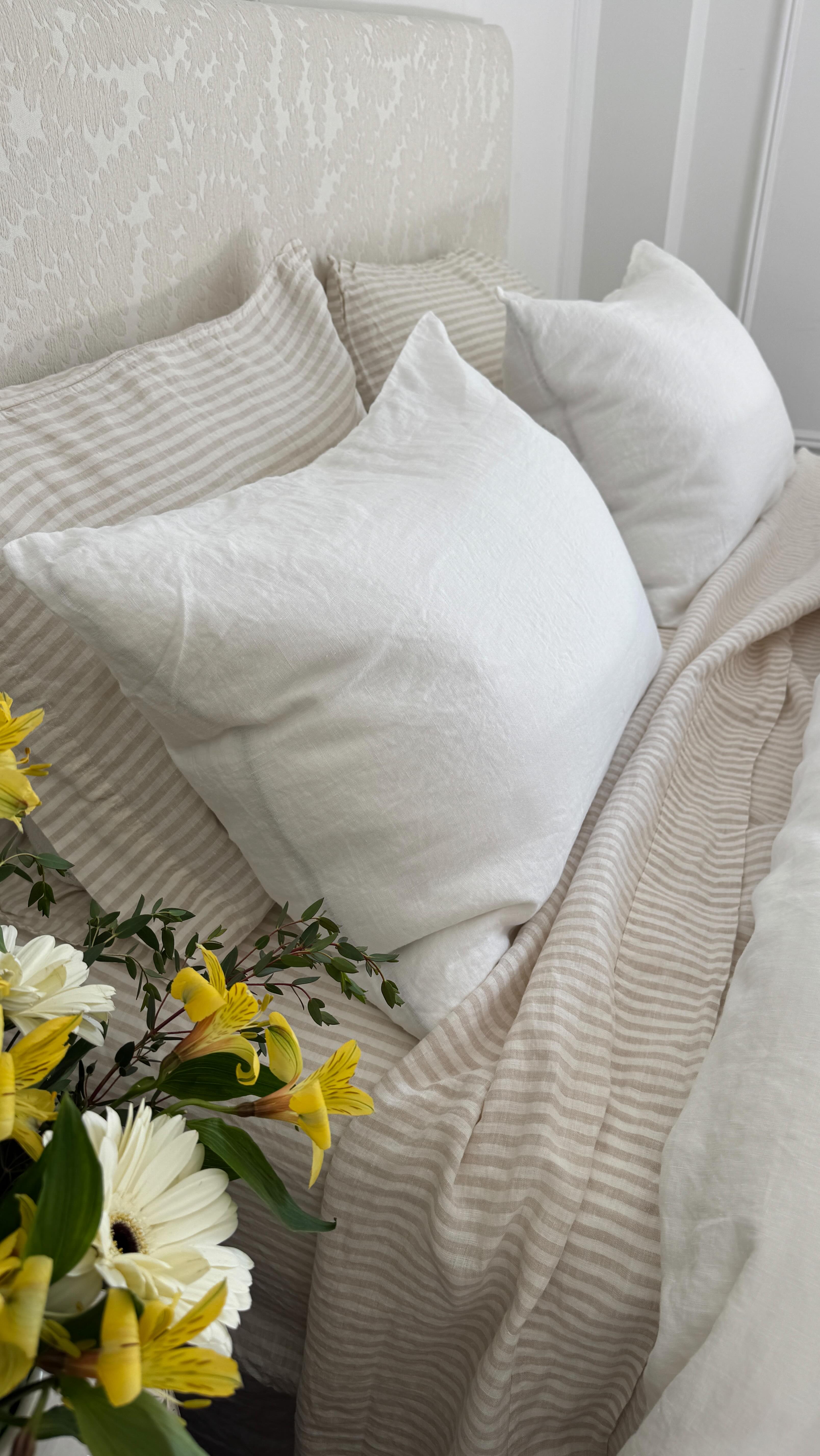 Instagram post by @mycityapartment for Garnet Hill. Caption reads: The bedroom (and myself!) are feeling so fresh and....