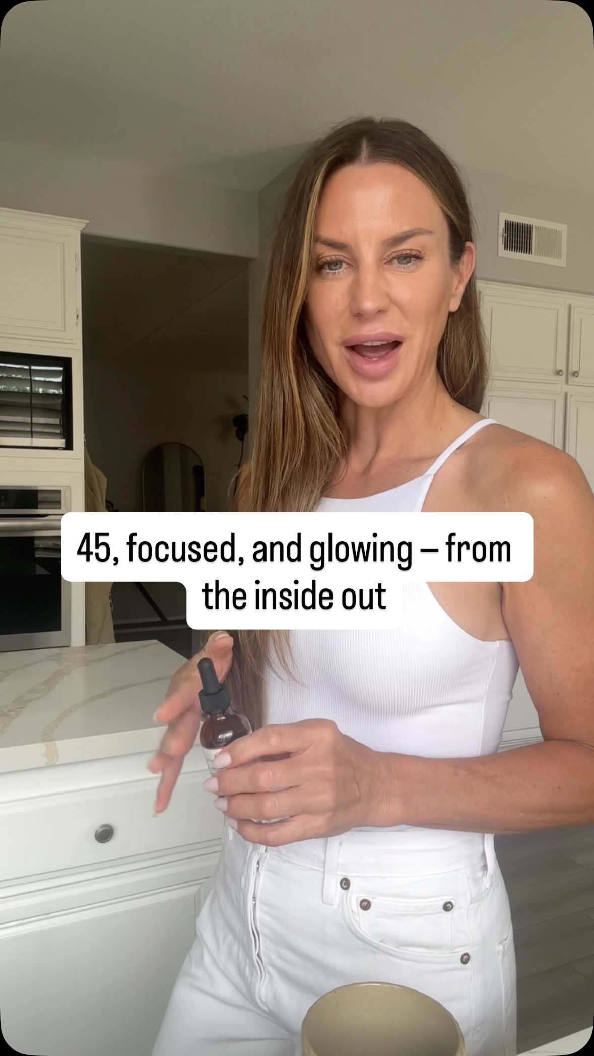 Instagram post by @devinedwelling for Auri Nutrition. Caption reads: Two years ago, my glow-up began the moment I....