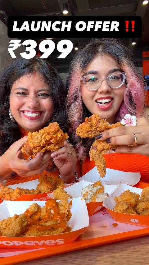 Instagram post by @gluttony.guru for Popeyes. Caption reads: [...] chicken lover🥰 Visit any of the 2 new....