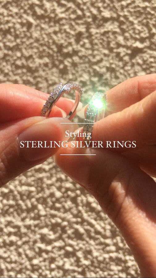 Instagram post by @remarkable__jade for EAMTI Jewelry. Caption reads: Styling rings by @eamti_jewelry ! They are so....