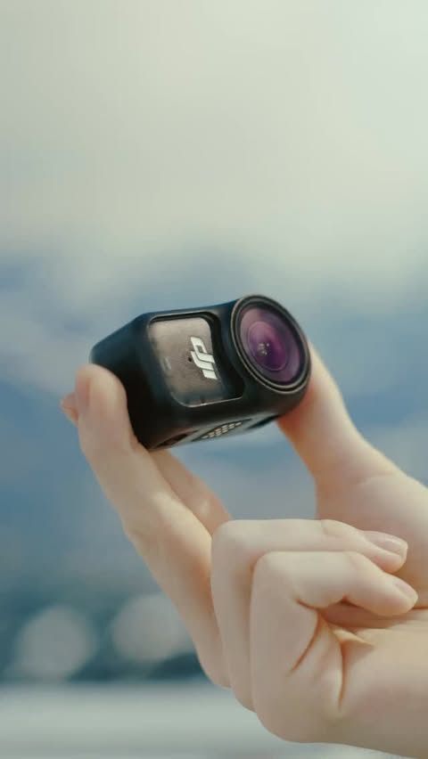 Instagram post by @ayitsphotography for DJI. Caption reads: capturing the world at any size 📸 the DJI Osmo....