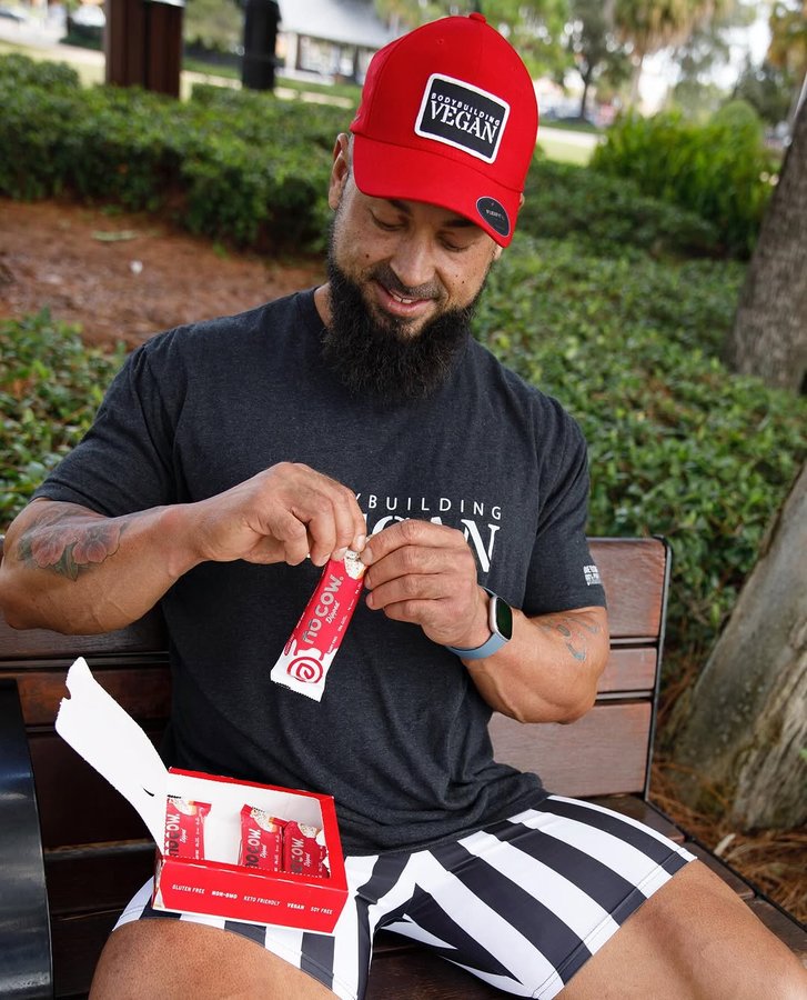 Instagram post by @thebodybuildingvegan for No Cow. Caption reads: #sponsored @nocow Life isn’t always a walk in the....