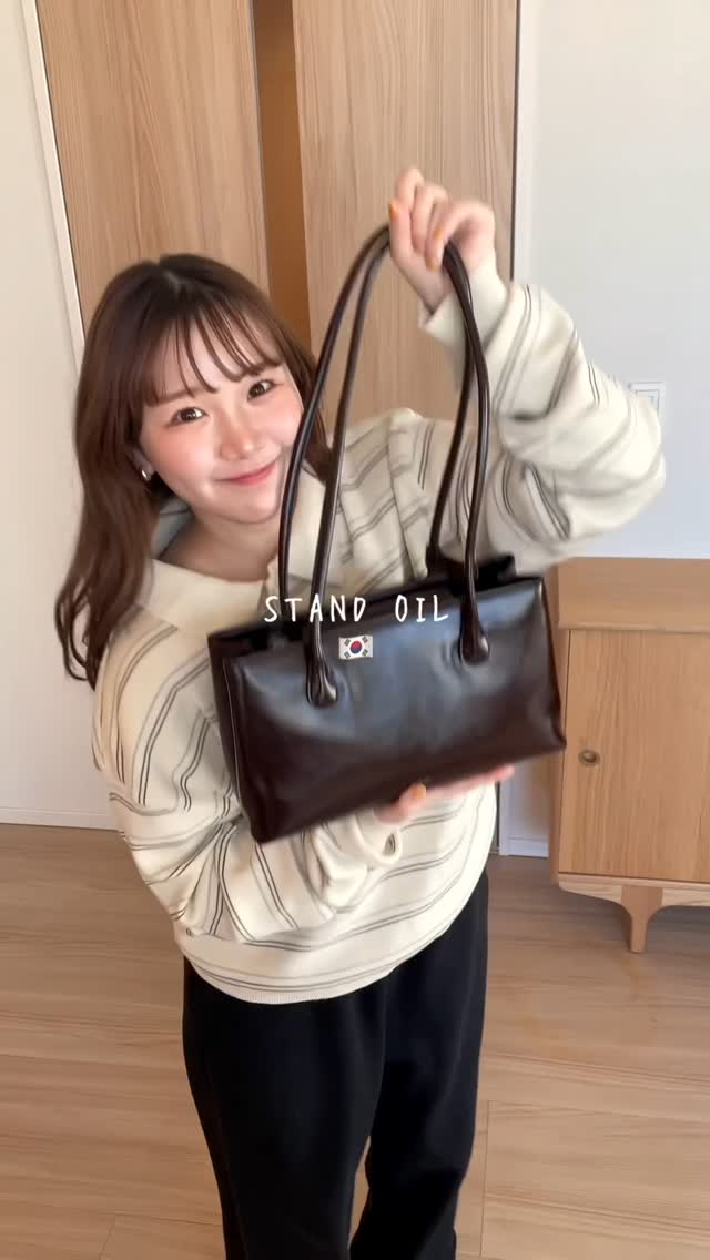 Instagram post by @kirimaruuu for Stand Oil. Caption reads: だいすきなわたしのバッグ紹介👜♡

日本でも大人気のスタンドオイルが
2/7〜2/14にかけて、バ....