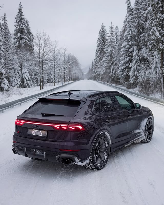 Instagram post by @auditography for Audi USA. Caption reads: Winter magic with the Amethyst Pearl effect RSQ8....