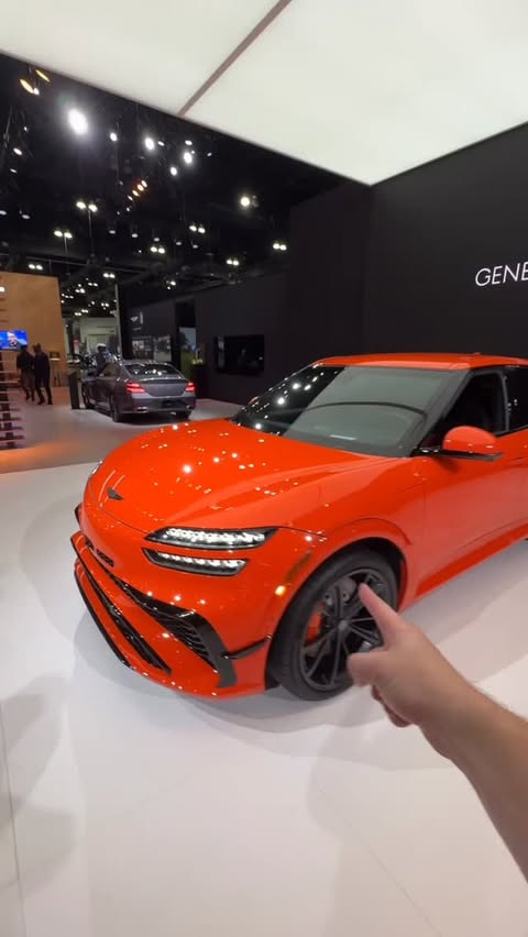 Instagram post by @carbuzz for Genesis USA. Caption reads: The @genesis_usa #gv60 Magma is hot in more ways....